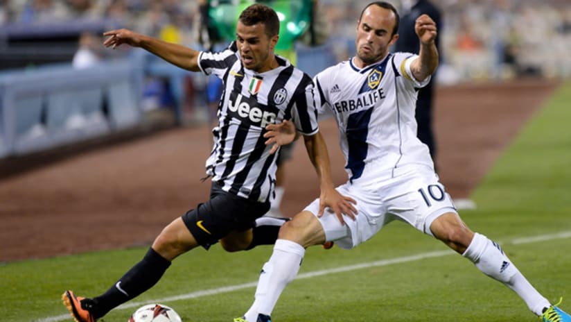 Sebastian Giovinco with Juventus against Landon Donovan and LA Galaxy