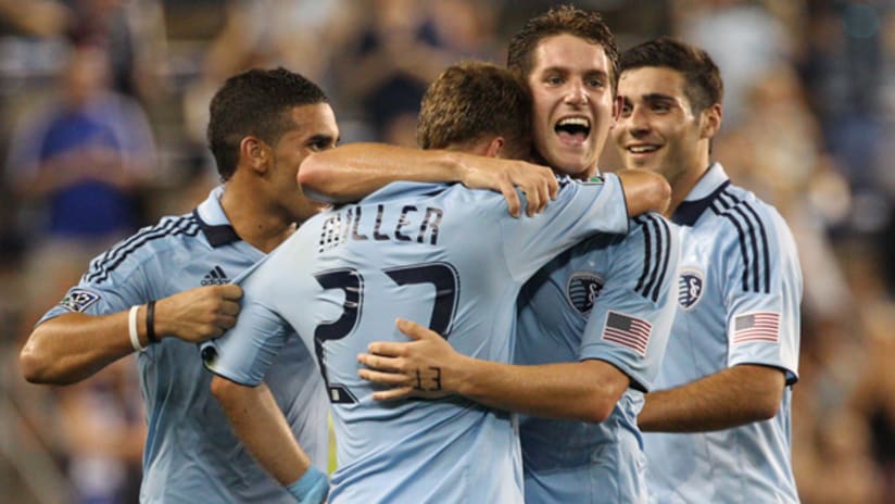 Kyle Miller and Sporting KC celebrate their draw with Stoke