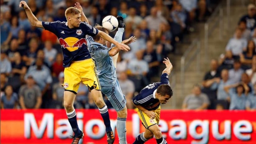 New York and Sporting KC players vie for the ball