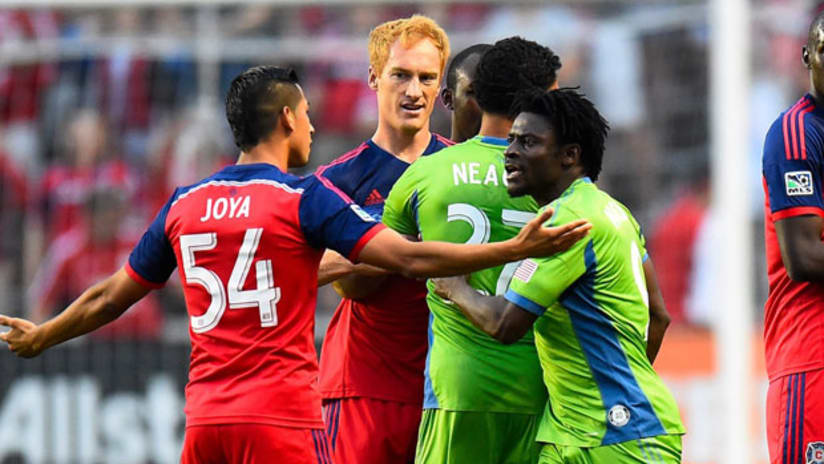 Chicago Fire and Seattle Sounders players argue