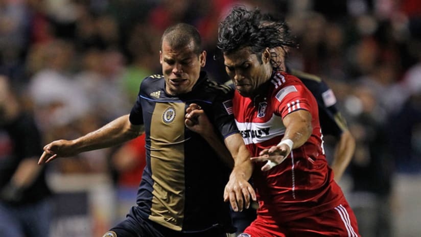 Wilman Conde (right) and the Fire got the best of Alejandro Moreno and the Union in a 2-1 win in June.