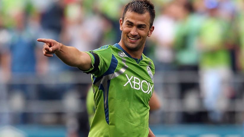 Seattle's Patrick Ianni celebrates after scoring a spectacular goal against Sporting KC.