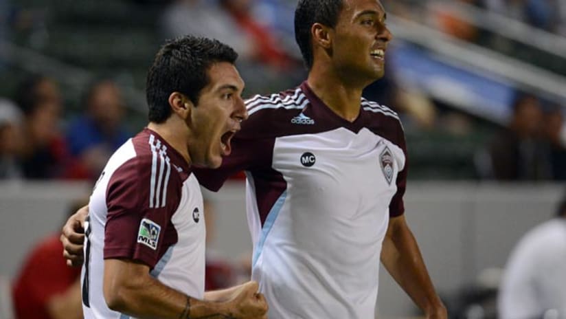 Kamani Hill and Martin Rivero celebrate a Rapids goal vs. Chivas USA