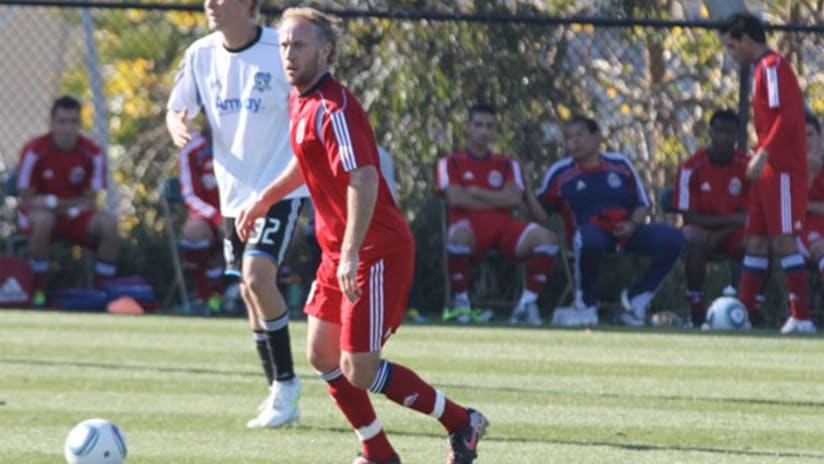 Simon Elliott was signed after a brief trial with Chivas USA.