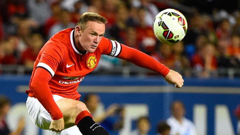 Wayne Rooney - Manchester United - Action shot, jumps for ball