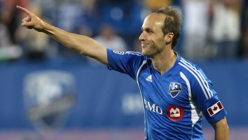 montreal impact midfielder justin mapp points at something