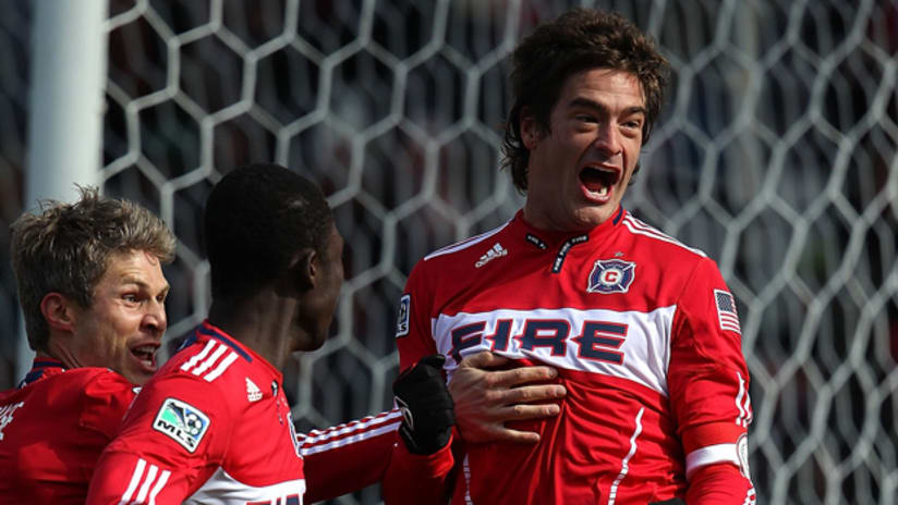 Diego Chaves (right) celebrates the first goal of the Chicago Fire's 3-2 win over Sporting Kansas City on Saturday.