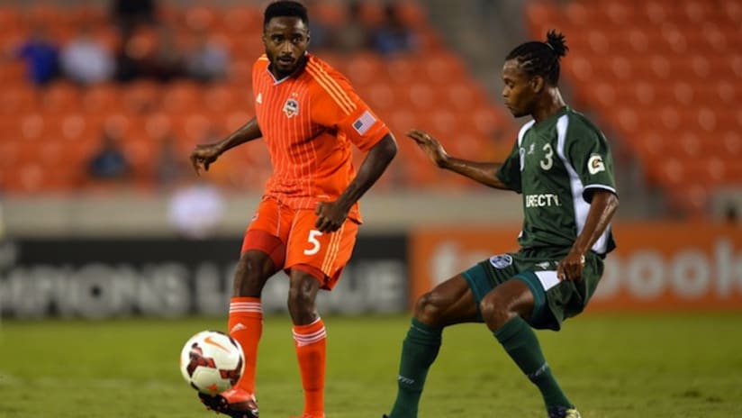 Warren Creavalle goes up against a W Connection player
