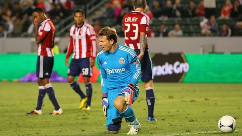 Chivas USA players react after giving up goal to RSL