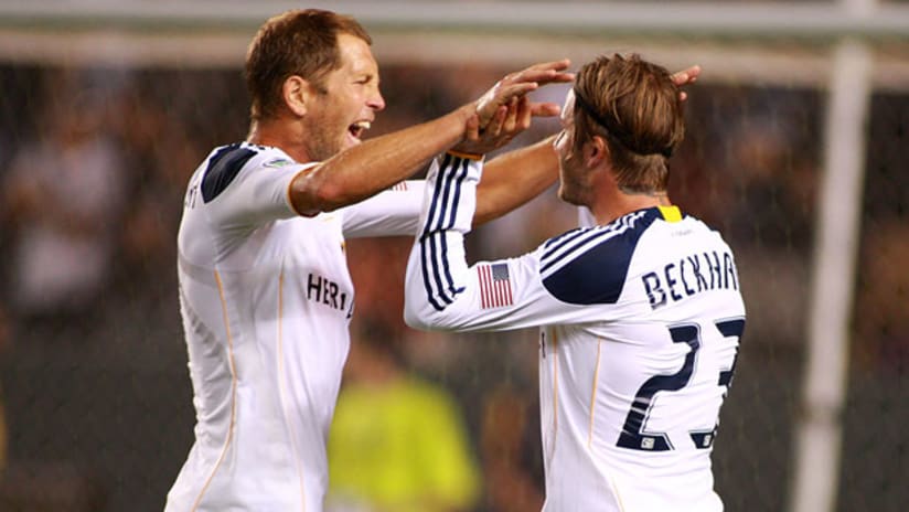 Gregg Berhalter and David Beckham.