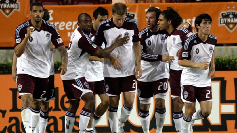 The Colorado Rapids celebrate a goal against the Houston Dynamo on March 3.