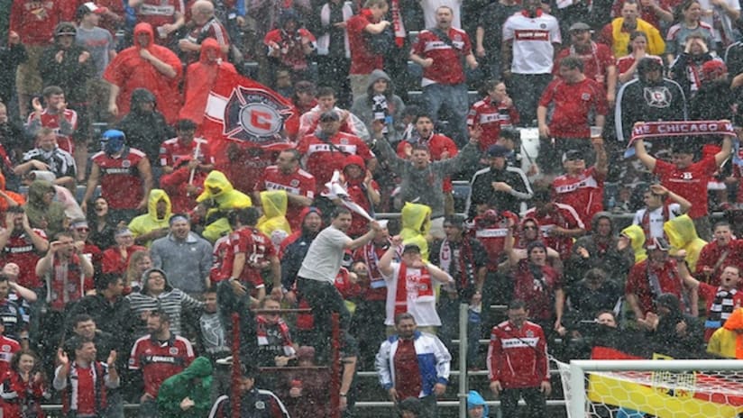 Section 8 sings in the rainstorm that forced an abbreviated 1-1 draw with Houston
