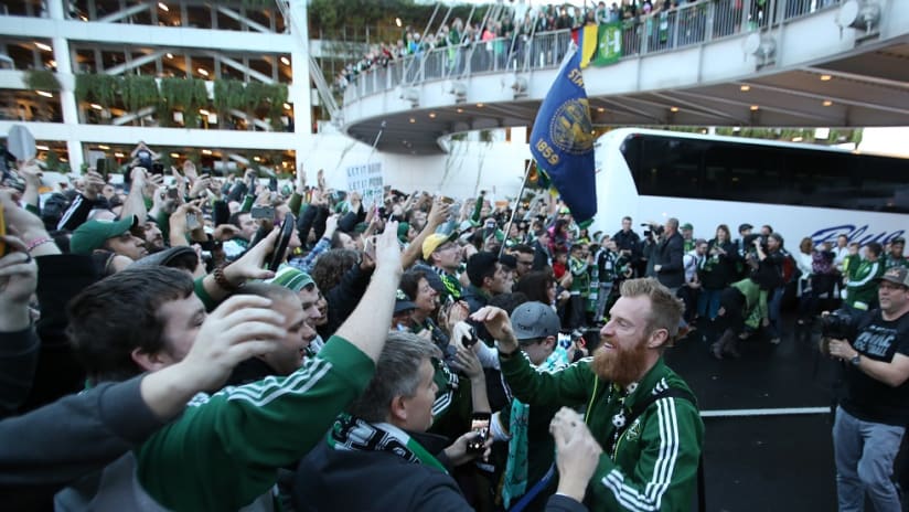 Nat Borchers celebrates with MLS Cup at the Portland Airport - Portland Timbers - Celebration
