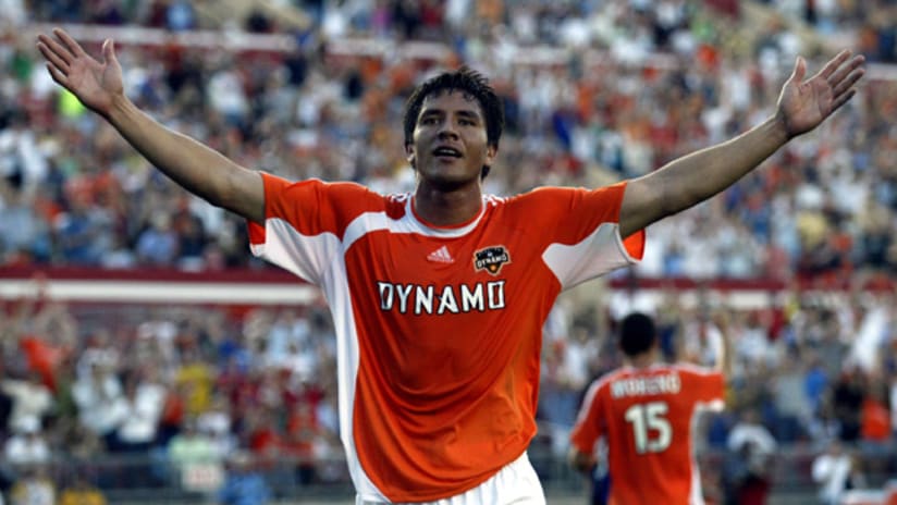 Houston's Brian Ching celebrates a goal in the opening game at Robertson Stadium in 2006.