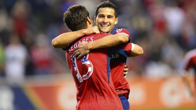 Dilly Duka and Gonzalo Segares embrace