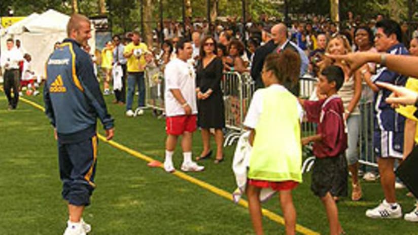 The crowd of kids and families at Jacob Schiff Field in Harlem made an impression on David Beckham.