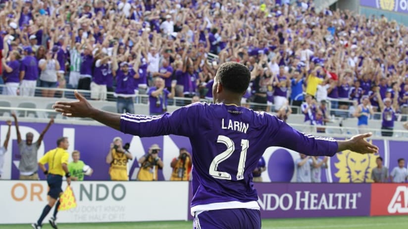 Orlando City forward Cyle Larin celebrates in front of the Citrus Bowl crowd