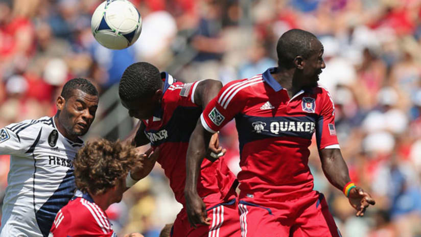 Jalil Anibaba and Dominic Oduro try to head the ball