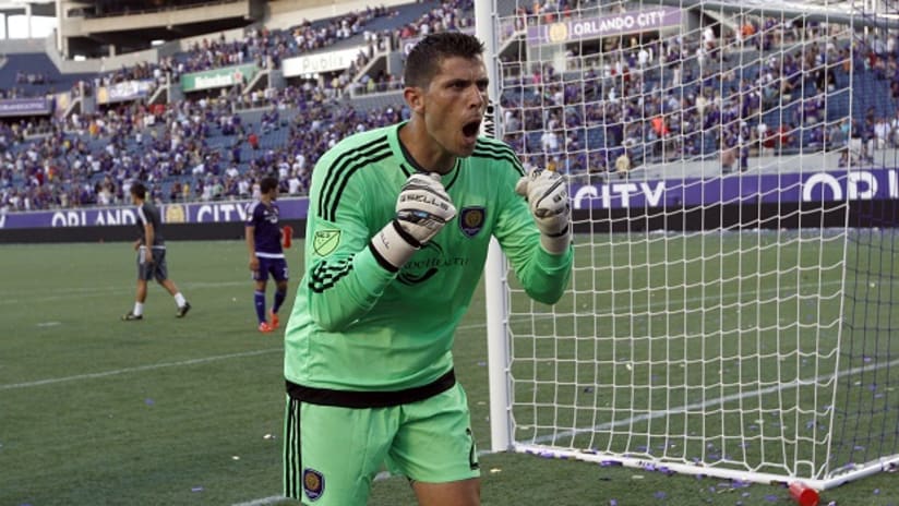 Orlando City SC goalkeeper Tally Hall celebrates in his Lions debut