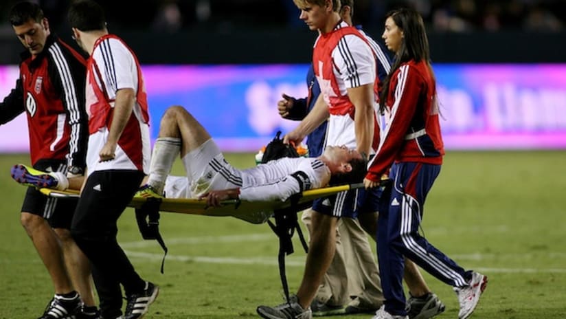 dc united winger chris pontius stretchered off the field