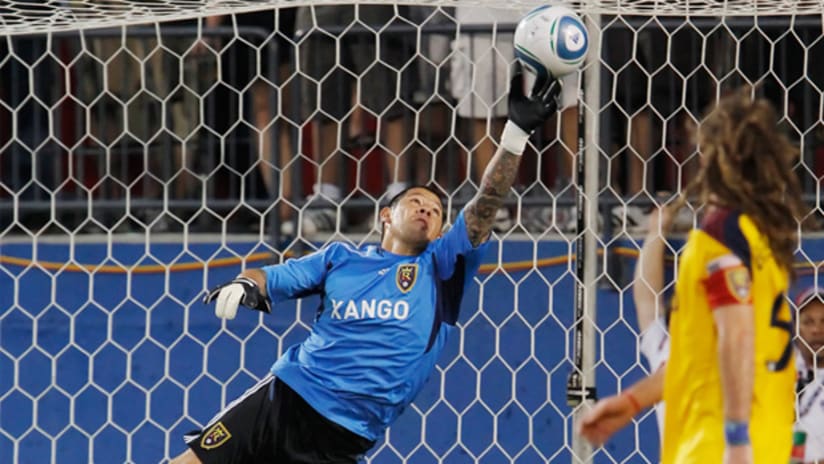 Real Salt Lake's Nick Rimando makes a save against FC Dallas on Sunday night in Frisco, Texas.