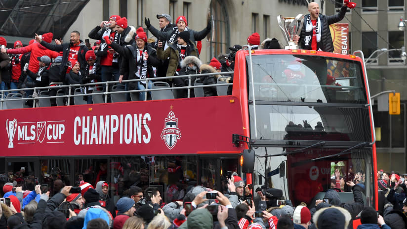 Toronto FC - with MLS Cup on double-decker bus at victory parade