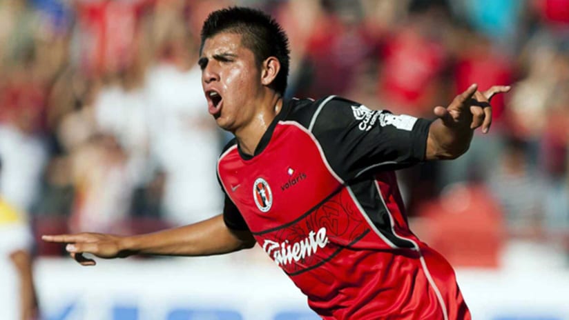 Tijuana's Joe Coronoa celebrates his team's first-ever Primera Division goal.