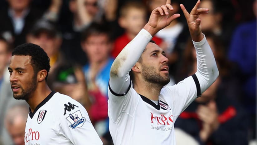 Clint Dempsey (right) scored both Fulham goals in the Cottagers' 2-0 defeat of Wigan on Saturday.