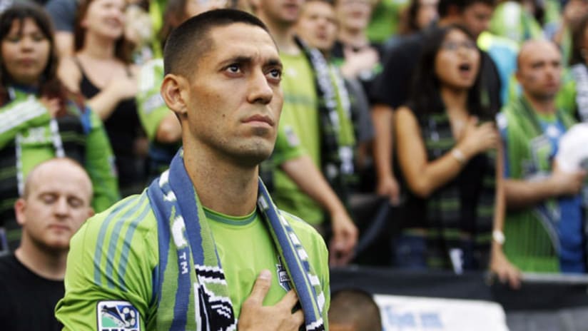 Clint Dempsey listens to Star-Spangled Banner at CenturyLink Field after being introduced to the Seattle Sounders fans.
