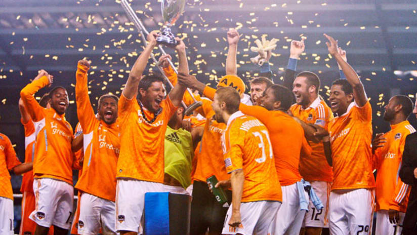 The Houston Dynamo lift the Eastern Conference trophy