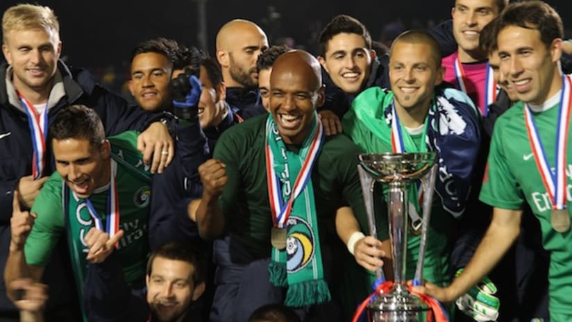 Marcos Senna and the New York Cosmos celebrate their Soccer Bowl win