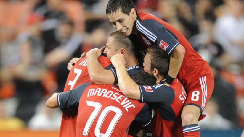 TFC celebrate their second goal against DC