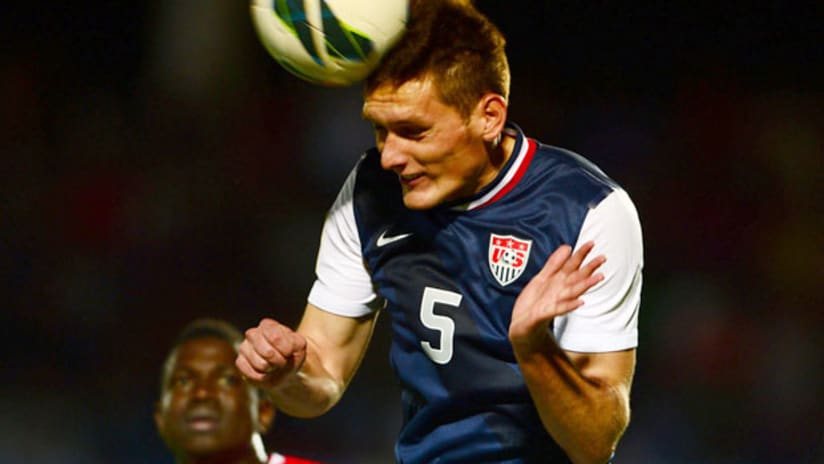 US Under-20 national team defender Shane O'Neill heads the ball