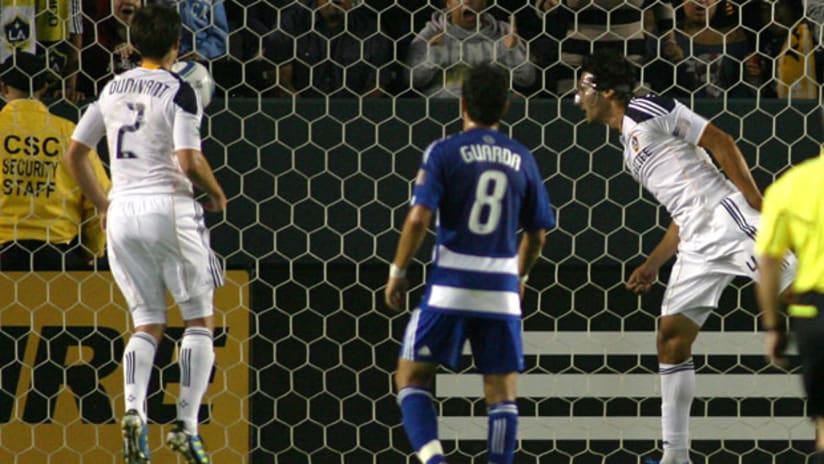 Omar Gonzalez heads the ball into the FC Dallas net.