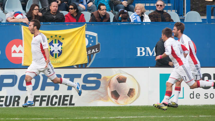 Soares celebrates Revs goal vs Montreal
