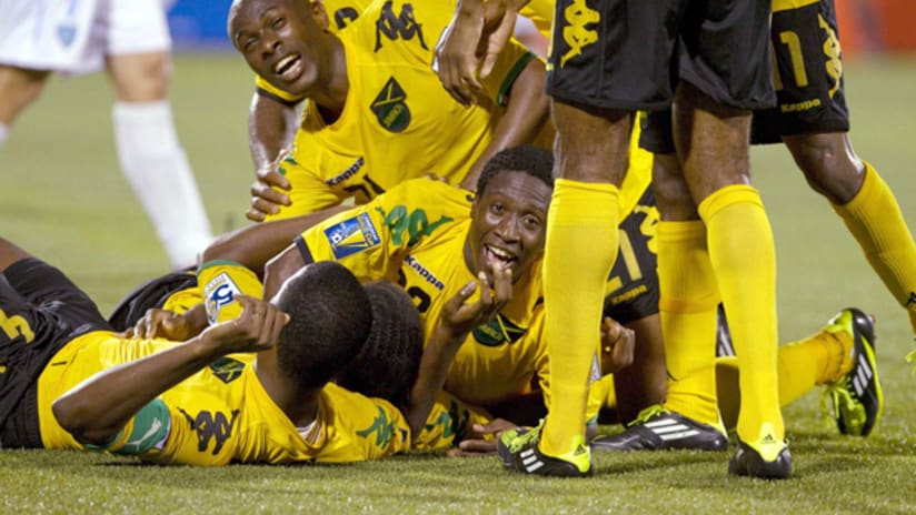 Jamaica celebrate as they advance to the quarterfinals after beating Guatemala.