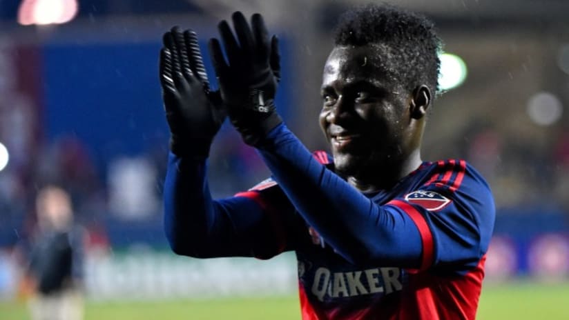 David Accam (Chicago Fire) claps after a game