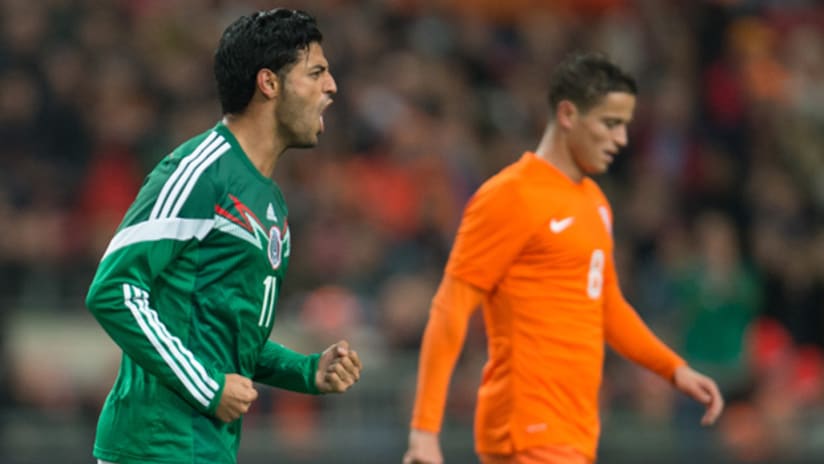 Carlos Vela celebrates his goal for Mexico against the Netherlands