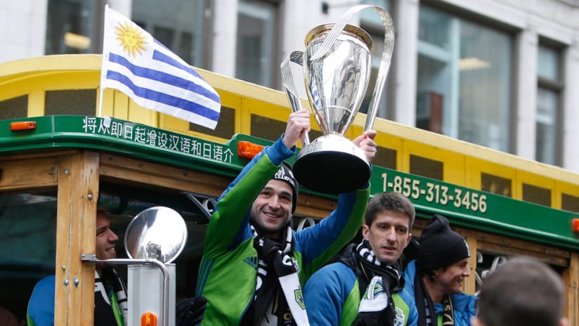 Nicolas Lodeiro - Seattle Sounders - Raises MLS Cup at victory parade