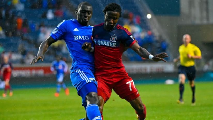 Bakary Soumare (Montreal Impact) challenges Kennedy Igboananike (Chicago Fire)