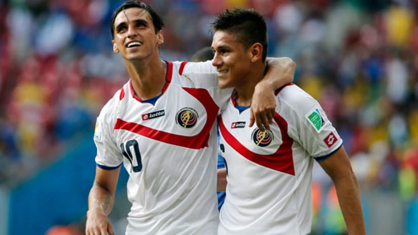 Bryan Ruiz and Oscar Duarte celebrate win vs. Italy (June 20, 2014)