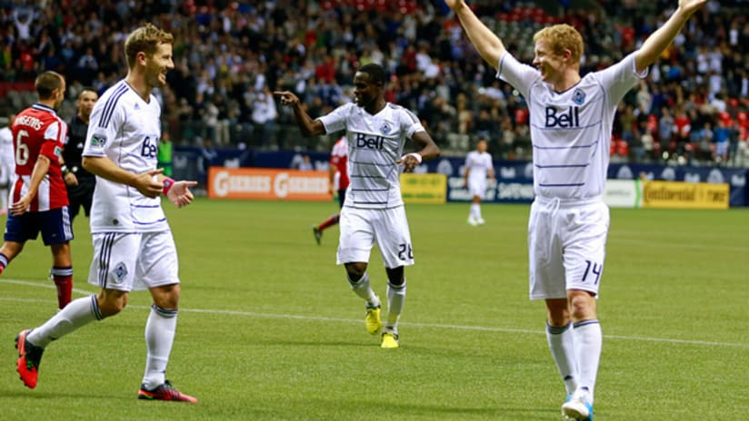 Vancouver's Barry Robson (right) celebrates his goal vs. Chivas USA