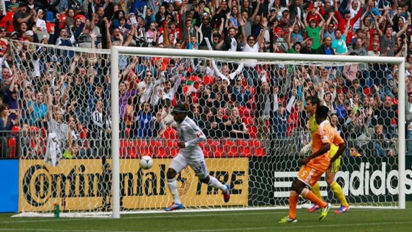 Darren Mattocks celebrates his goal against the Houston Dynamo