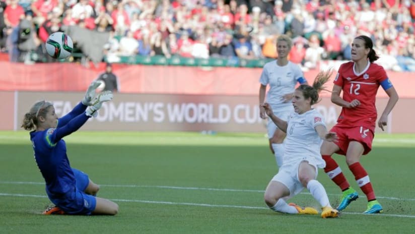 Erin Nayler (New Zealand) makes a save on Christine Sinclair's shot (Canada) in the 2015 Women's World Cup