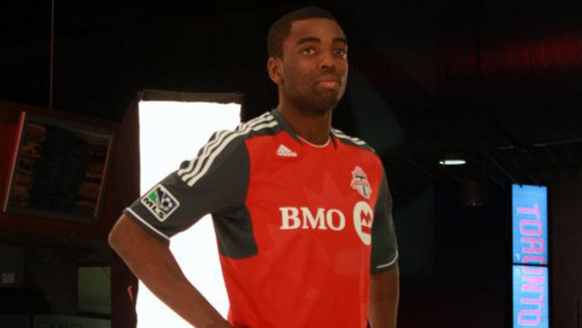 Aaron Maund posing in Toronto FC jersey at media day