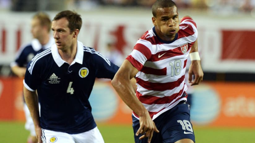 Scotland's Andy Webster chases USA's Terence Boyd.