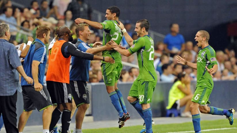Lamar Neagle celebrates a goal for Seattle in August 2011.