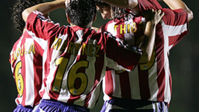 Chivas USA players celebrate a goal in their U.S. Open Cup game against Charlotte.