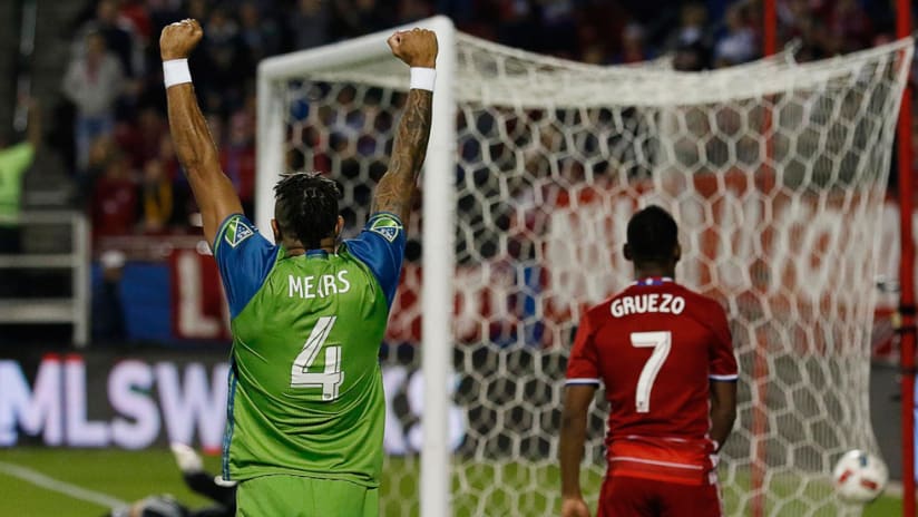 Seattle Sounders - Tyrone Mears - Celebrates with sad FC Dallas players around