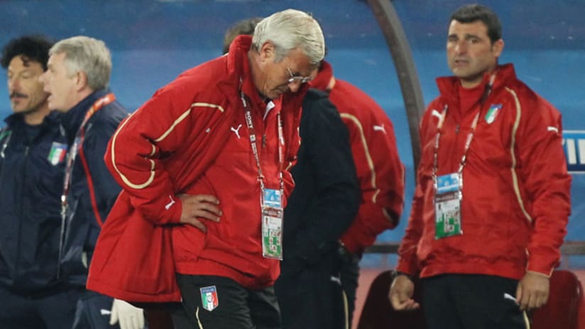 Italian manager Marcello Lippi has no answers for his team's early exit in his last game in charge